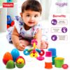 Baby playing with Funskool Giggles Link Stack ‘N Nest Toy Set