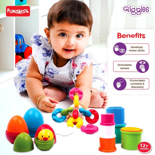 Baby playing with Funskool Giggles Link Stack ‘N Nest Toy Set